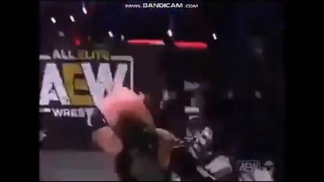The Butcher suplexes Pentagon Jr through table смотреть онлайн