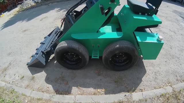 Обзор нового фронтального мини погрузчика MultiTractor смотреть онлайн