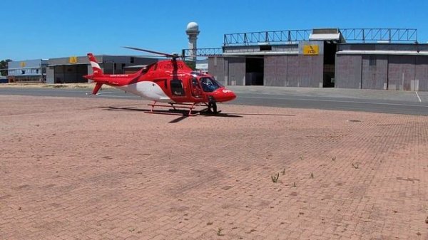 AGUSTA AW119 HELICOPTER IN HOVER.