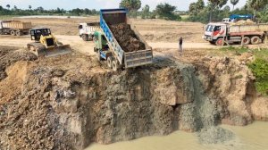 Строительство, другой обзор, на один из прошлых объектов, засыпка пруда, начало