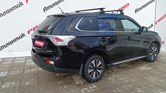Обзор на Mitsubishi Outlander Кроссовер 5-дв. 2.0 CVT (146 л. с.) Черный 2014 г. смотреть онлайн