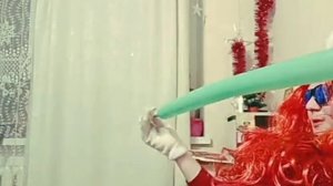 Надувание длинного шарика лёгкими