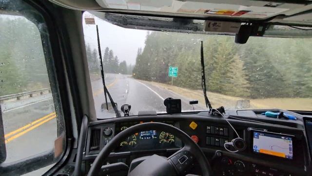 POV Truck Driving. Snow Trap. Volvo VNL 760