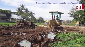 Komatsu D21A Bulldozer Spreading Debris