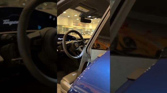 The all-new 2023 Porsche Taycan in Gentian Blue Metallic. смотреть онлайн