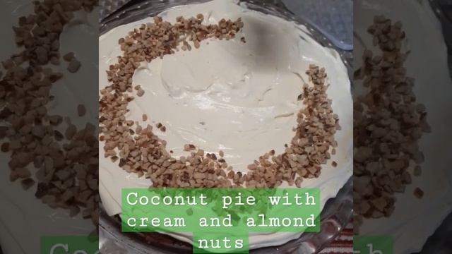 our Easter sunday dessert coconut pie with cream and almond nuts. смотреть онлайн