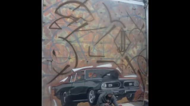Alex Thompson Paints a Barracuda with a Custom Background on our Bay door at Jacobs Upholstery смотреть онлайн