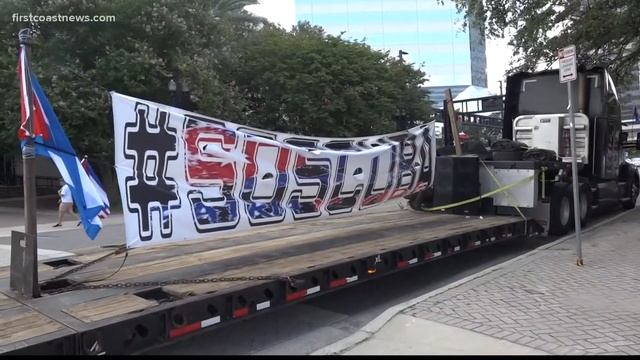 Many gather for free Cuba protest in Jacksonville Saturday смотреть онлайн