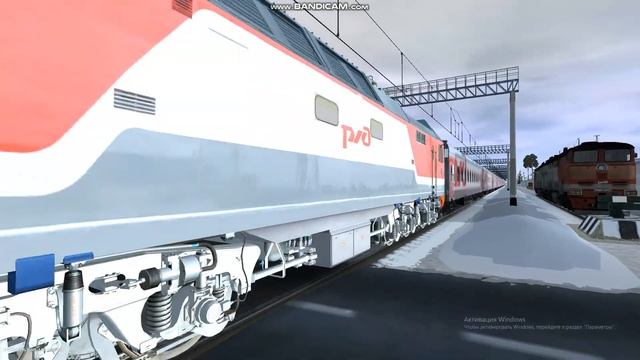 ЭП2К-117 с пассажирским поездом следует мимо переезда смотреть онлайн