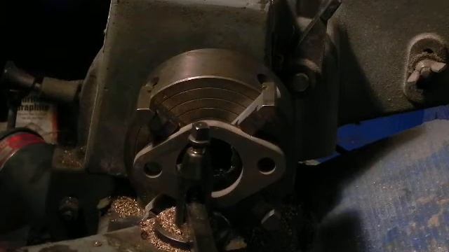 Opening up a 1.5 GP Amal flange to fit 38.5mm tube manifold. смотреть онлайн