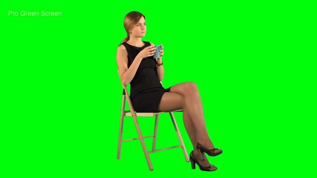 Girl sitting on chair and driking coffee Green Screen Footage смотреть онлайн