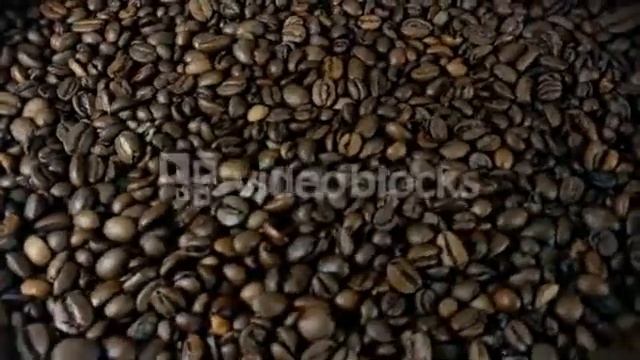 Rotating Roasted Brown Coffee Beans 4K Footage смотреть онлайн