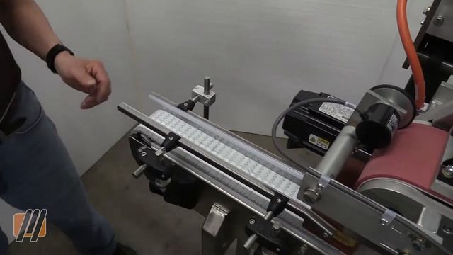 Applying Tin Tie Closure To Coffee Pouch