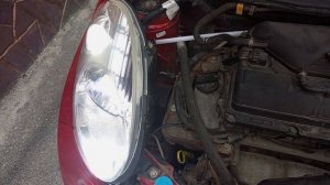 Ниссан Микра установка лед лампы в фару.