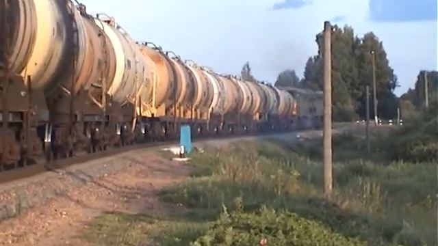 2ТЭ10М-3552 с грузовым поездом, перегон пост 25 км - Богушевская смотреть онлайн