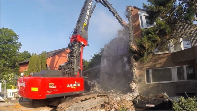 Bagger KMC 400 Longfront Abriss Vila смотреть онлайн