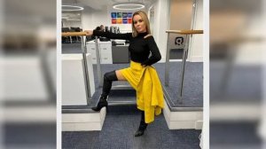 Amanda Holden risks flashing fans as she lifts up leg in mini skirt and thigh high boots