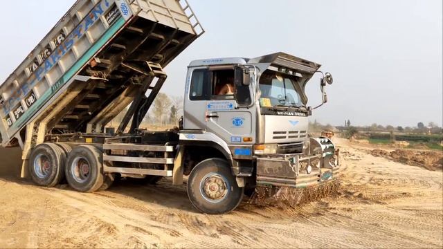 UD Nissan Diesel Trucks Unloading And Carrying Heavy Loads