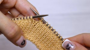 Вяжем две петли вместе лицевой с наклоном ВЛЕВО