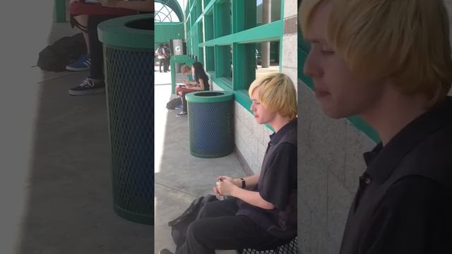 Kid plays harmonica at lunch. смотреть онлайн