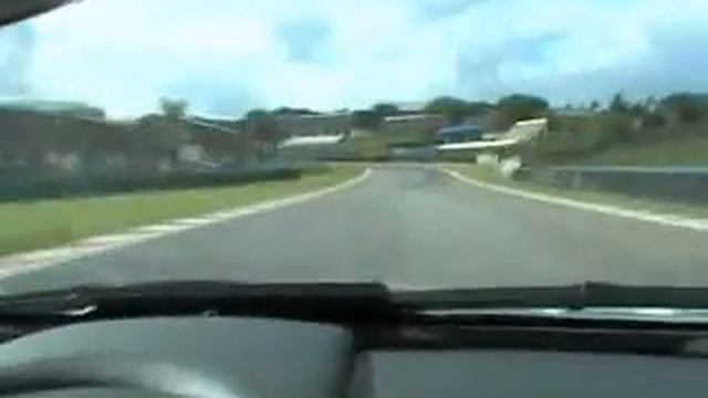 Mercedes Benz SLR on a racetrack смотреть онлайн