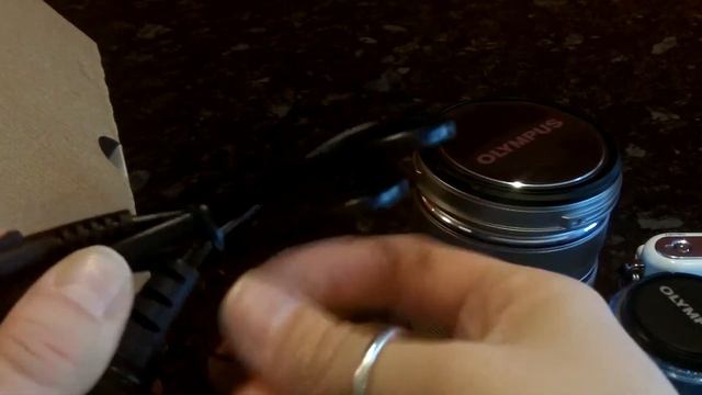 Olympus PEN E-PM1 + Double Zoom Kit Unboxing смотреть онлайн