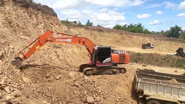 Excavator Red Hitachi 210 & Hitachi 200 Loading Truck