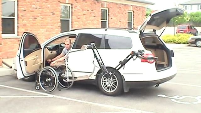 robot 2001 arm putting wheelchair into VW passat смотреть онлайн