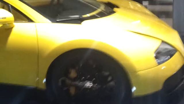LIMITED EDITION BUGATTI GRAND SPORT CONVERTIBLE IN YELLOW AT DEALERSHIP IN BERKELEY SQUARE LONDON смотреть онлайн