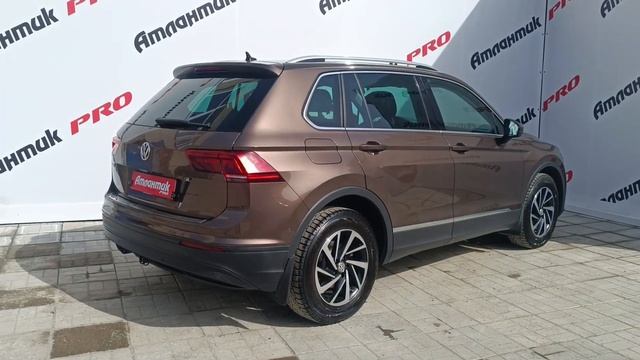 Обзор на Volkswagen Tiguan Кроссовер CITY 1.4 TSI BlueMotion DSG (150 л.с.) 2WD Коричневый 2018 г. смотреть онлайн