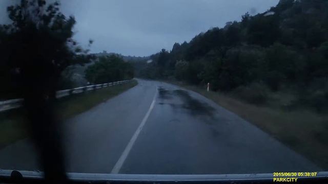 Sudak to Alushta serpentine road at morning dawn, rain and rock-falls. смотреть онлайн