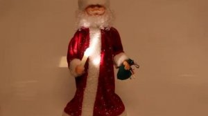 Дед Мороз музыкальный 39см красный со свечой и мешком