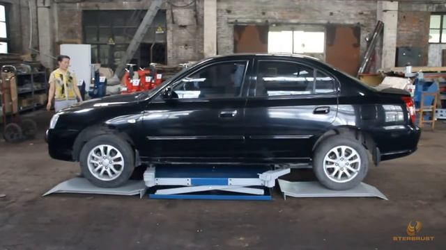 Подъемник пневматический с лапами AE&T TJ-1025 2.5т