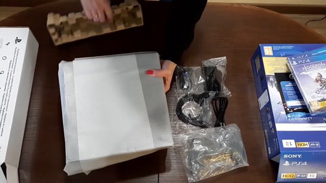 Распаковка игровой приставки PlayStation 4 1TB Black из Rozetka смотреть онлайн