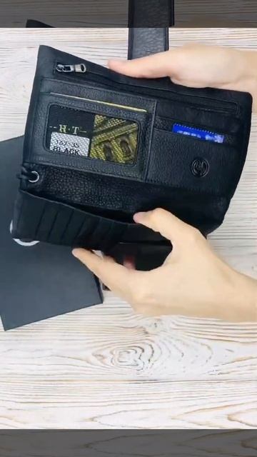 Мужской кожаный клатч-кошелёк H.T.Leather Чёрного цвета 162-35 смотреть онлайн