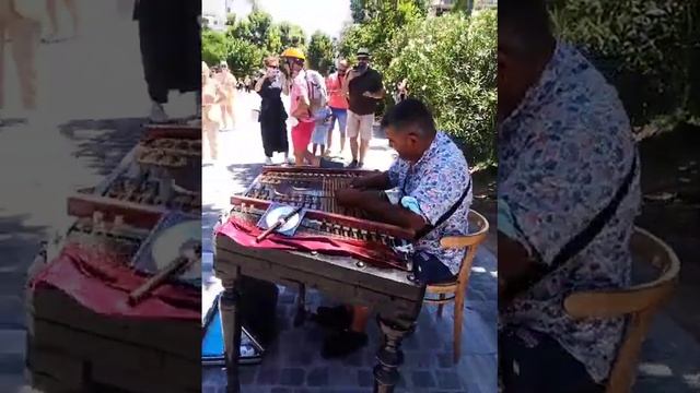 Parthenon at Acropolis, Athens. Listening to a Busker playing a sort of Xylophone. Brilliant!! смотреть онлайн