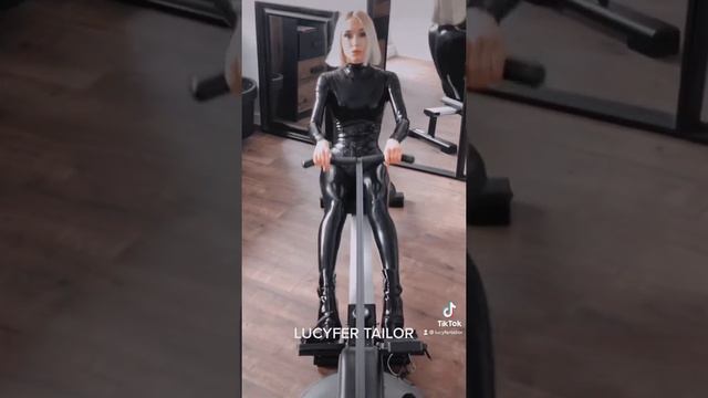 Rowing exercises in a latex suit смотреть онлайн