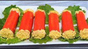 Вкусная и красивая праздничная закуска из крабовых палочек или рулетики.
