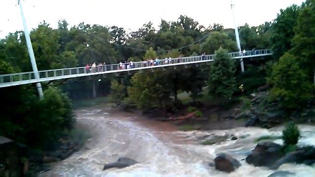 Kayaker takes waterfall at Falls Park after storm in Greenville, SC on 7/12/13 смотреть онлайн
