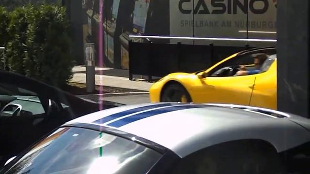 Yellow Lamborghini Murciélago LP 640 and yellow Ferrari 458 spider driving off смотреть онлайн