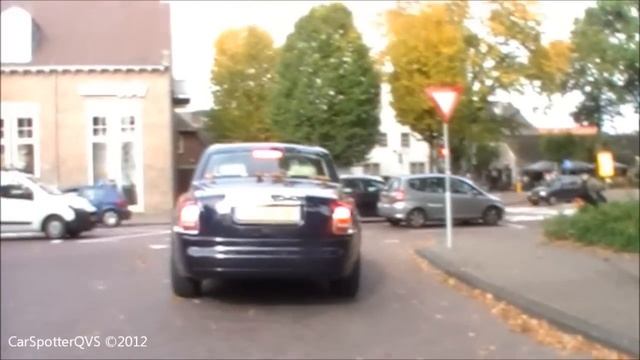 Some nice British supercars driving by: Aston Martins, Bentleys, Rolls-Royces! смотреть онлайн