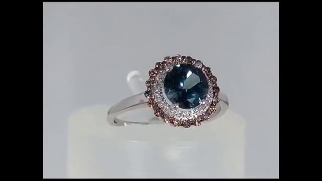 Кольцо из белого золота с бриллиантами и топазом 64691