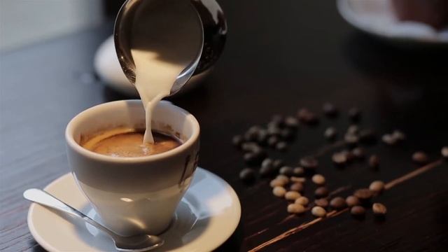 pouring milk into coffee in cafe смотреть онлайн