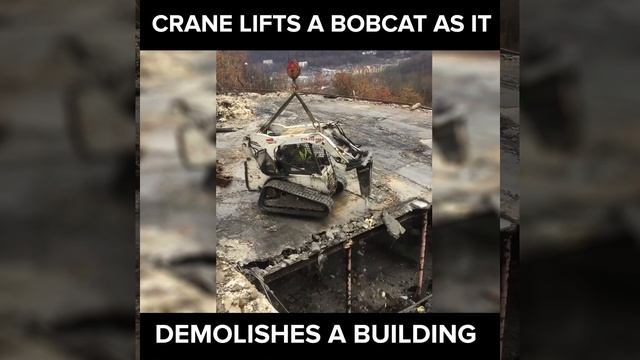 CRANE  Lifts A BOB CAT As It Demolishes A Building