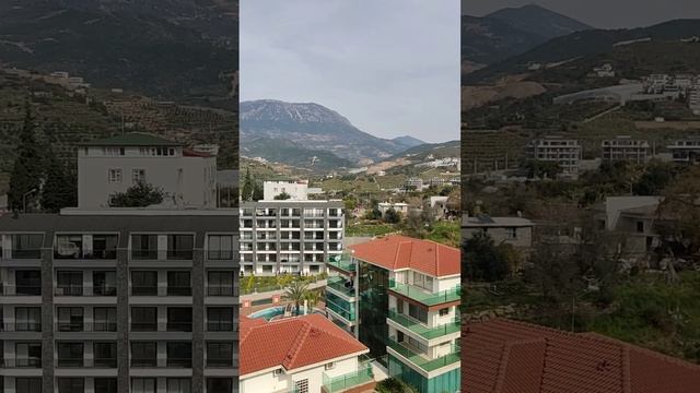 Вид на Средиземное море и Торосские горы в Каргыджак (Алания Турция). Виллы в три уровня. смотреть онлайн
