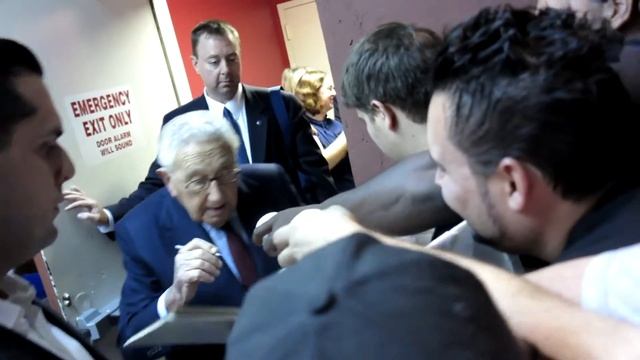 Secretary Of State Henry Kissinger Signing Autogaphs At Colbert Report
