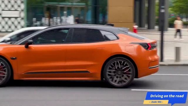 Zeekr 001 Driving on the road， looks absolutely stunning as it glides down the road смотреть онлайн