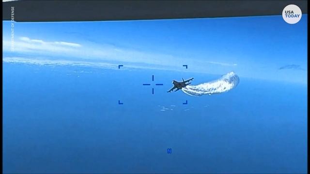 Pentagon releases video showing Russian jets interfering with a US drone | USA TODAY смотреть онлайн
