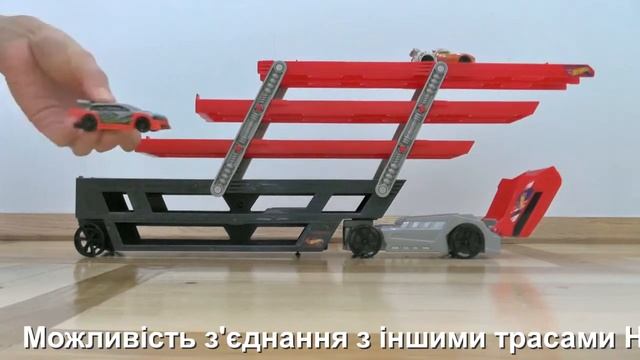 Великий автовоз мегатрейлер перевізник Хот вілс Hauler Hot Wheels вміщує понад 50 машинок хот вилс смотреть онлайн