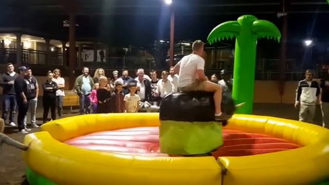 Gary riding the mechanical Bull at Stallions Restaurant's opening night смотреть онлайн